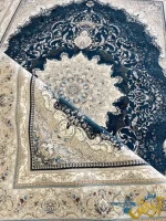 فرش سرمه ای گل برجسته دلوین 1200شانه کاشان